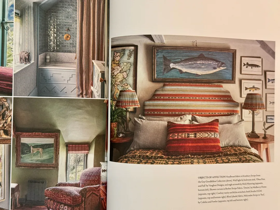 Bedroom with a kilim headboard and a painted fish above the bed