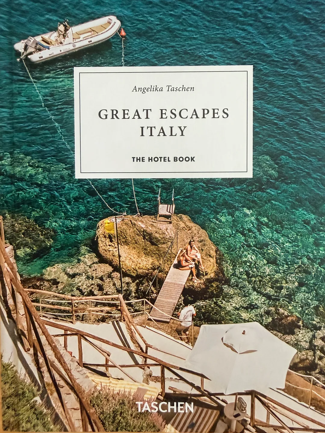 Great Escapes Italy: The Hotel Book by Angelika Taschen, cover with a turquoise cove and cliffside steps