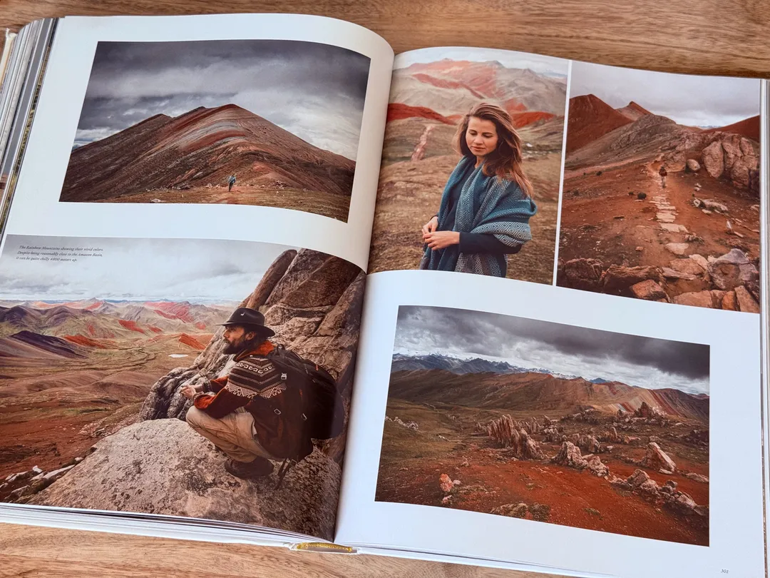 Rust-coloured mountains and a woman in a blue scarf