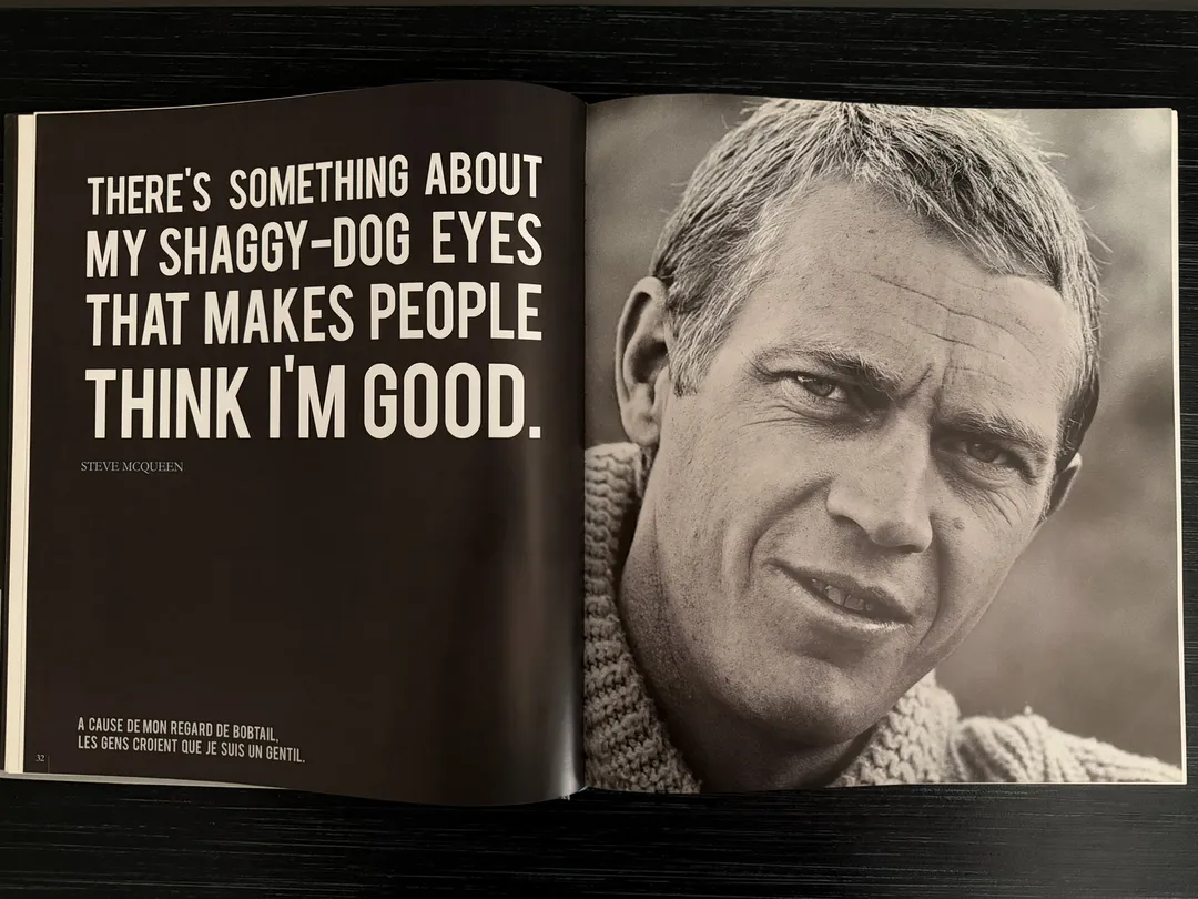 Close portrait of McQueen opposite a quote about his shaggy-dog eyes