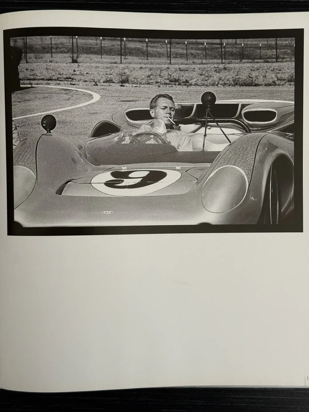 McQueen in a number 9 race car on the track
